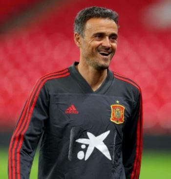 Pacho Martinez father Luis Enrique after being reappointed as coach of Spain.